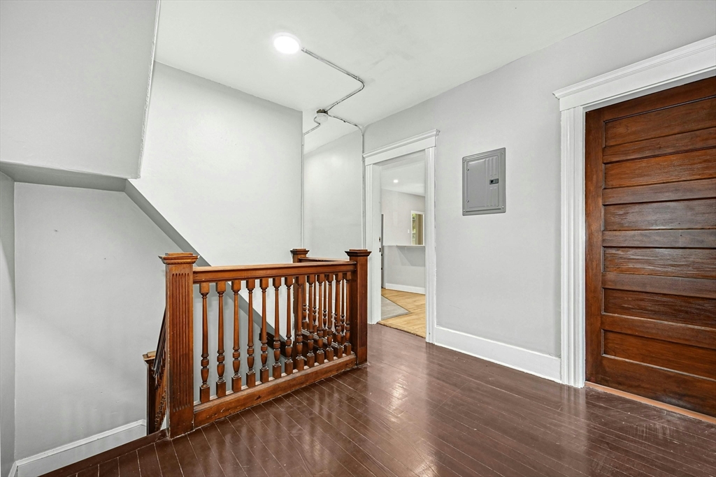 34 William Street Worcester, MA 01609 - Photo 30 of 41 a view of hallway with wooden floor