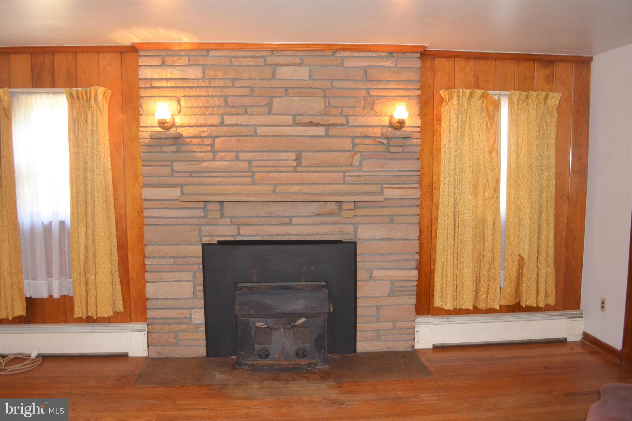 9061 Dumhart Road Laurel, MD 20723 - Photo 8 of 20 Living Room With Woodstove