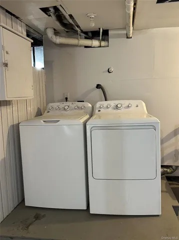 a utility room with dryer and washer