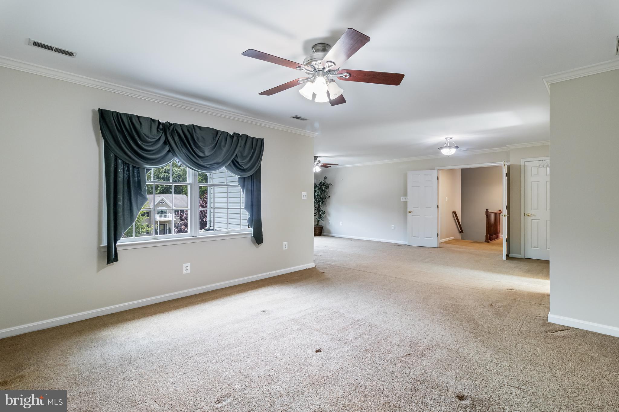 203 Morgans Ridge Court La Plata, MD 20646 - Photo 44 of 59 a view of a livingroom with a ceiling fan and window