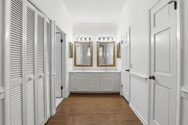 a bathroom with a shower and a sink