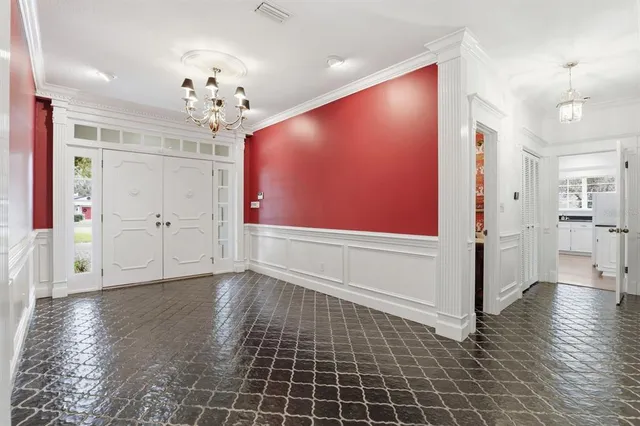 a view of an empty room and window