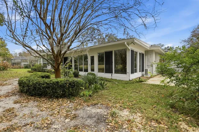 a view of a house with a garden