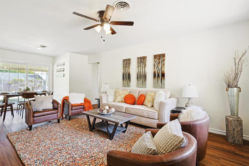 1401 South Stratton Street Decatur, TX 76234 - Photo 6 of 20 a living room with furniture and a rug