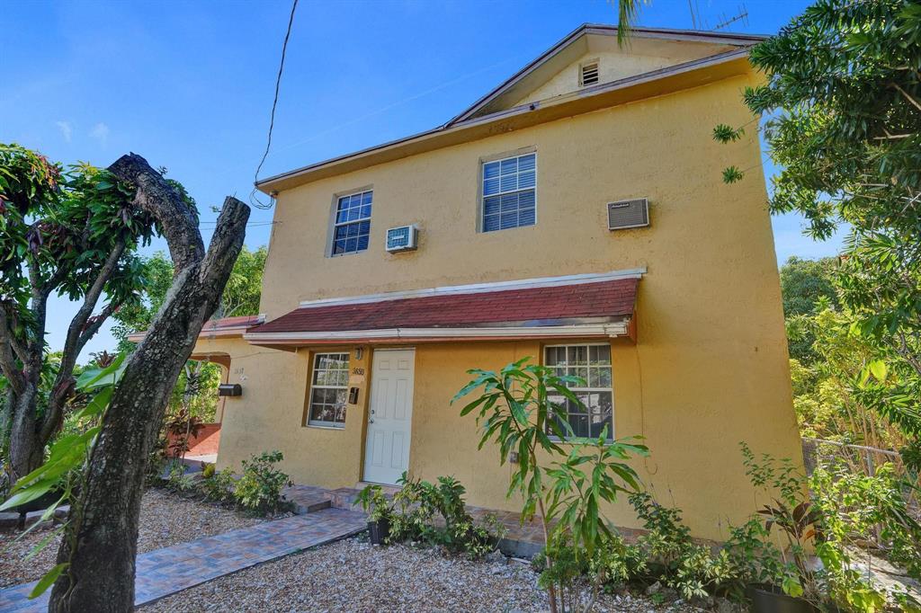 Allapattah Miami, FL 33142 - Photo 2 of 58 a front view of a house with a garden