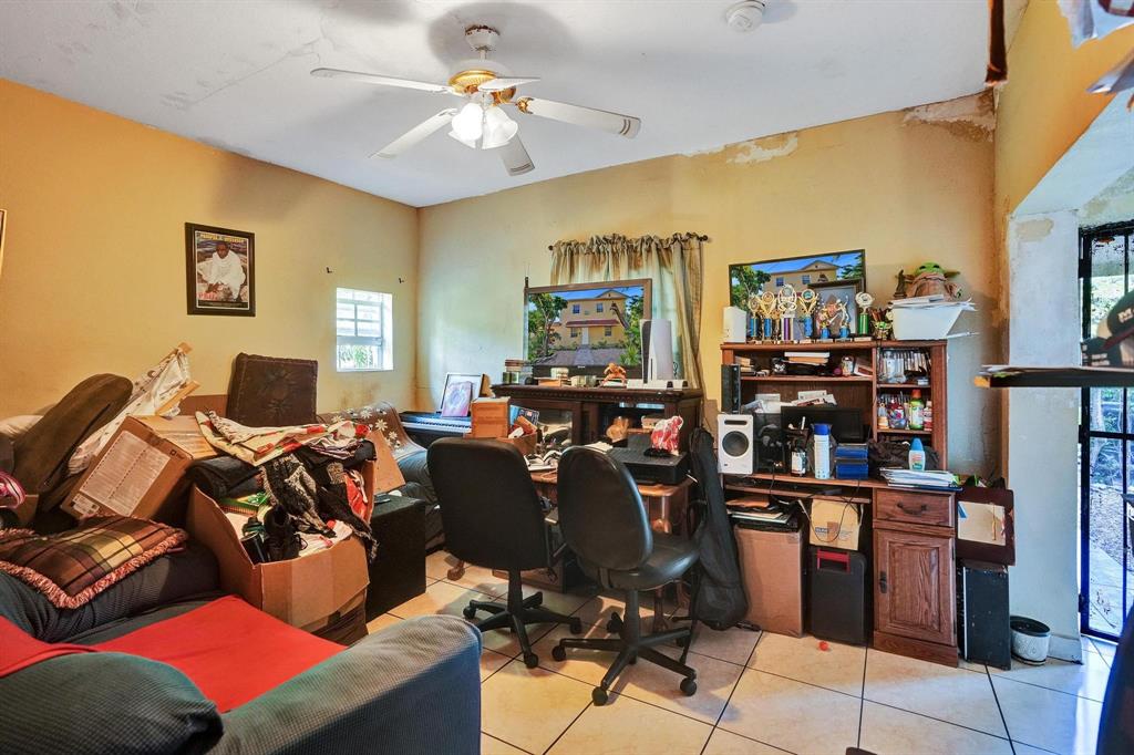 Allapattah Miami, FL 33142 - Photo 27 of 58 a view of a workspace with furniture and a livingroom