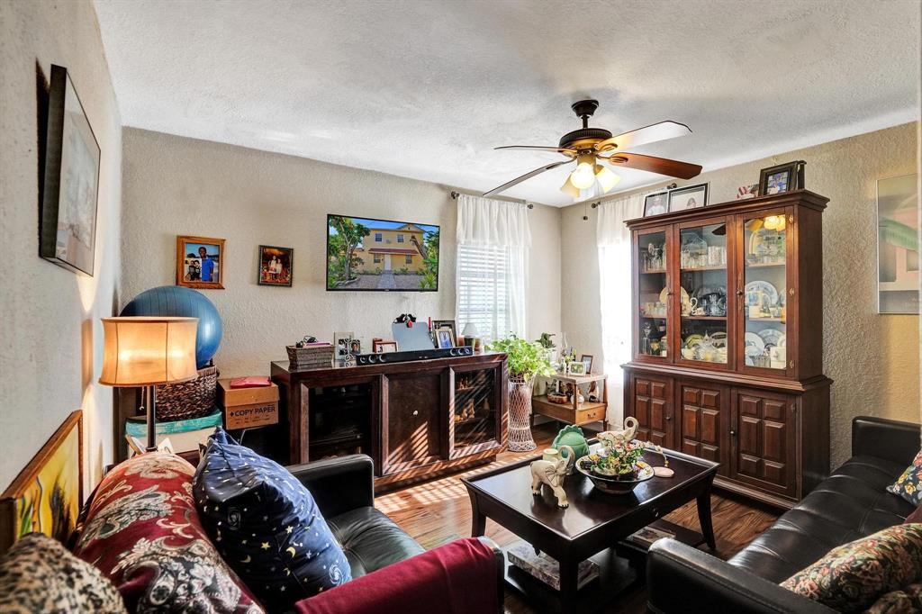 Allapattah Miami, FL 33142 - Photo 5 of 58 a living room with furniture a rug and a window