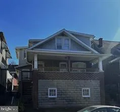 a front view of a house with garage
