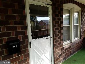 512 Sheridan Place Cumberland, MD 21502 - Photo 2 of 16 a view of a door and a window