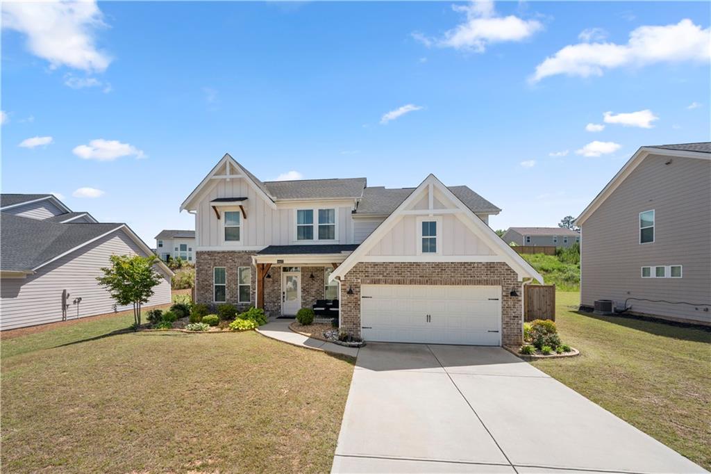 4607 Underwood Walk Powder Springs, GA 30127 - Photo 2 of 31 a front view of a house with a yard
