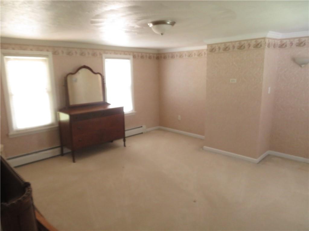 629 Freeport Road Butler, PA 16002 - Photo 17 of 26 a room with a window