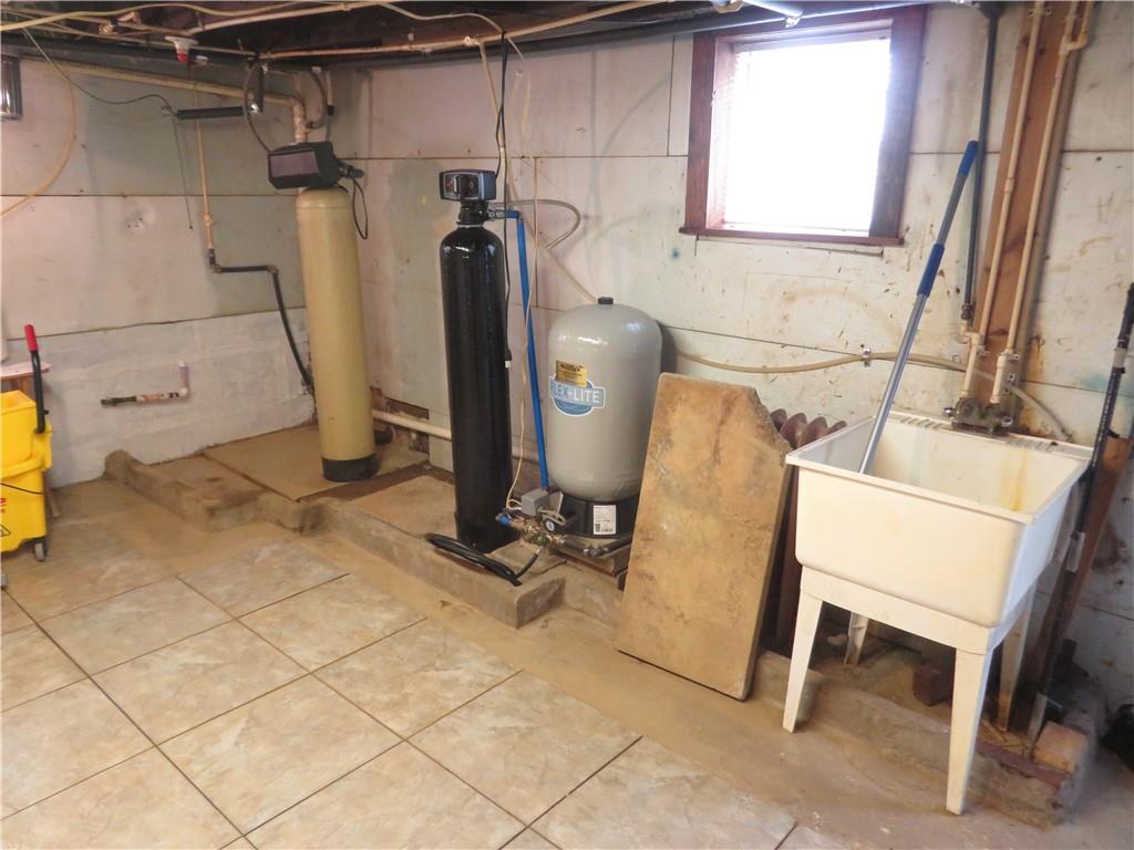 629 Freeport Road Butler, PA 16002 - Photo 21 of 26 a bathroom with a sink and a mirror