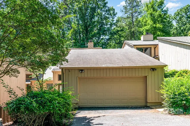 a view of a house with a garage