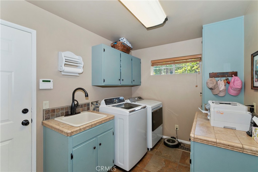 355 Cedar Ridge Drive Lake Arrowhead, CA 92352 - Photo 34 of 64 Laundry w/utility sink/loads of storage.