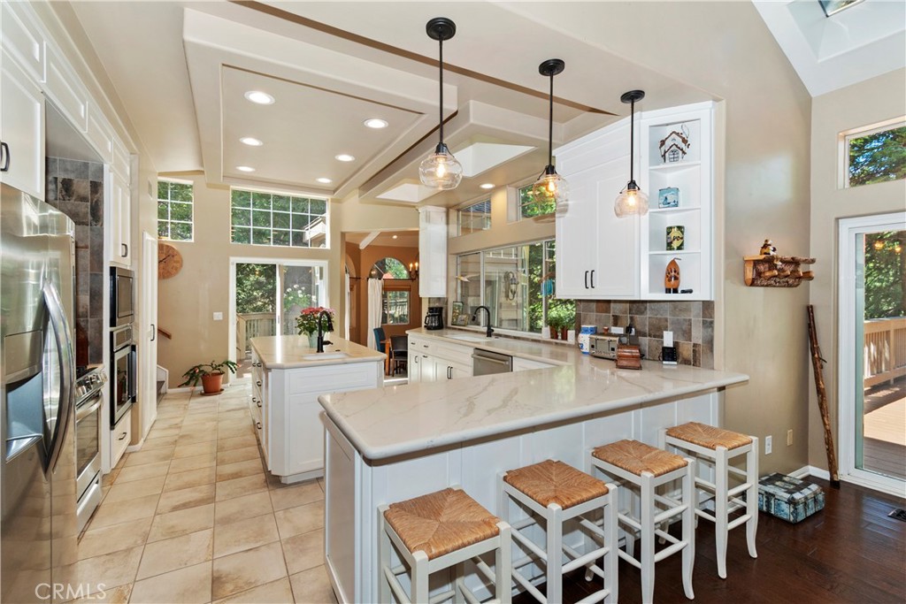 355 Cedar Ridge Drive Lake Arrowhead, CA 92352 - Photo 7 of 64 Large well-lit kitchen. BIG oversized window over sink!!!