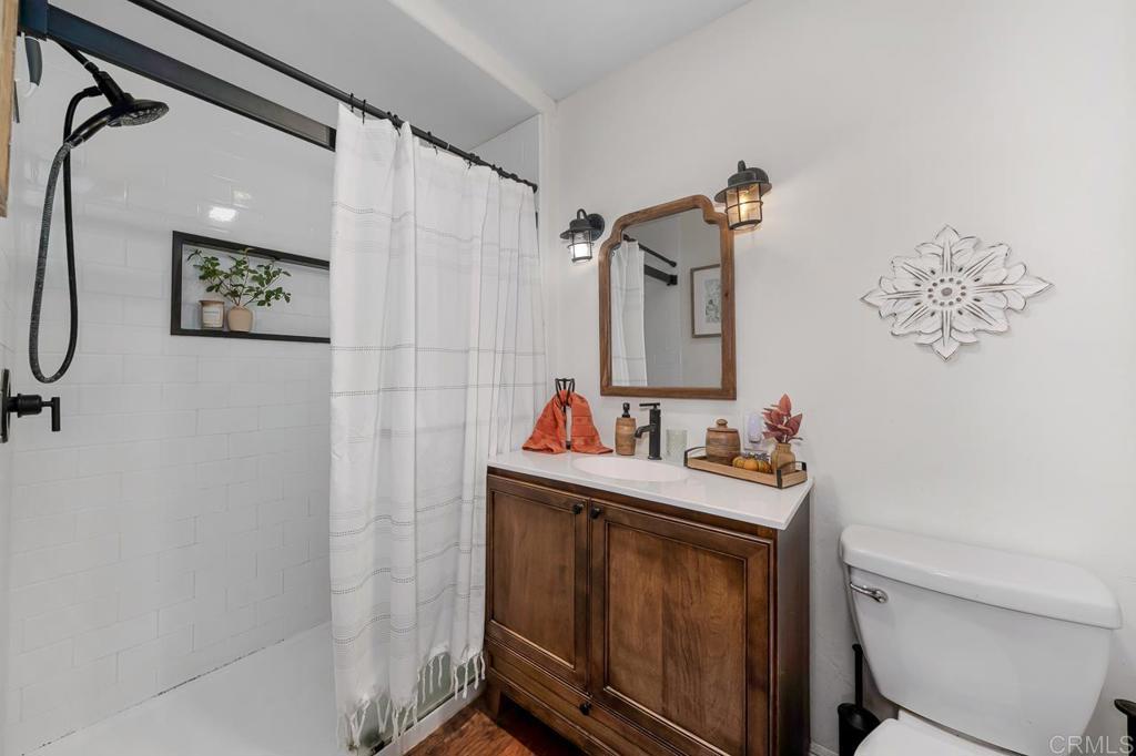 1356 South Grade Road Alpine, CA 91901 - Photo 23 of 68 a bathroom with a sink toilet and a mirror