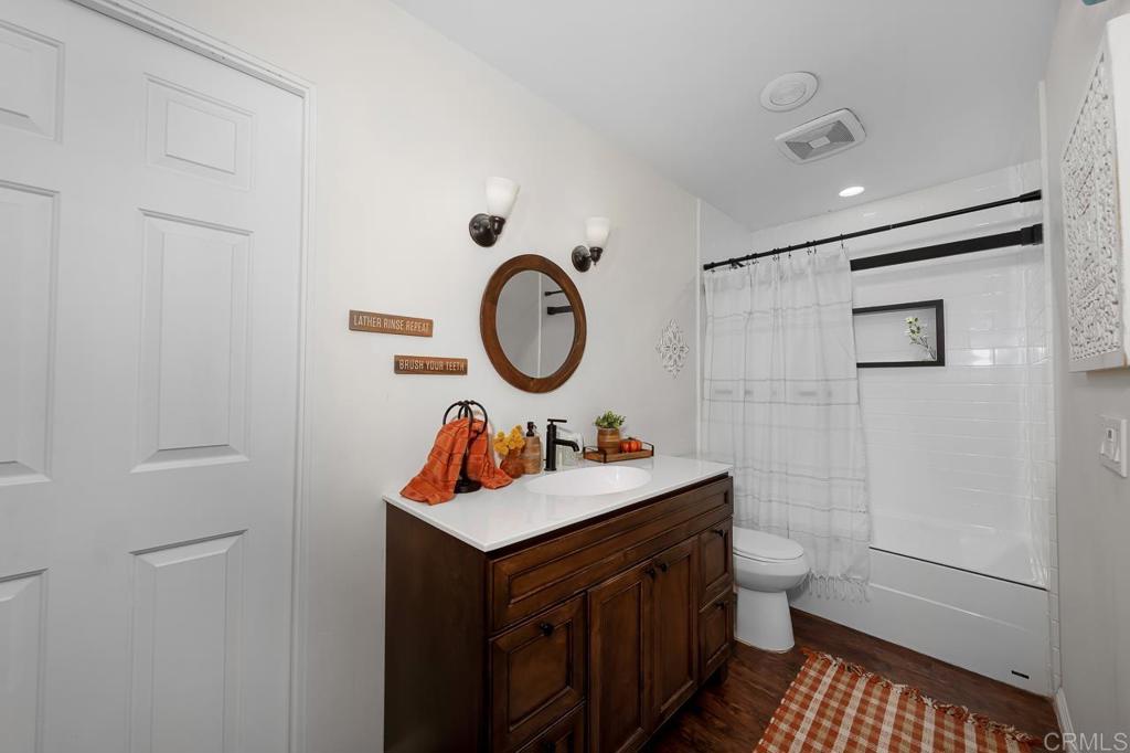 1356 South Grade Road Alpine, CA 91901 - Photo 27 of 68 a bathroom with a sink vanity granite and a mirror