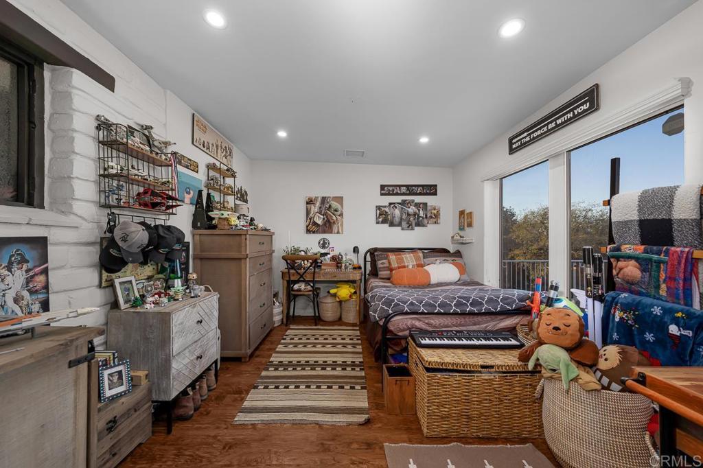 1356 South Grade Road Alpine, CA 91901 - Photo 28 of 68 a living room with furniture fireplace and flat screen tv