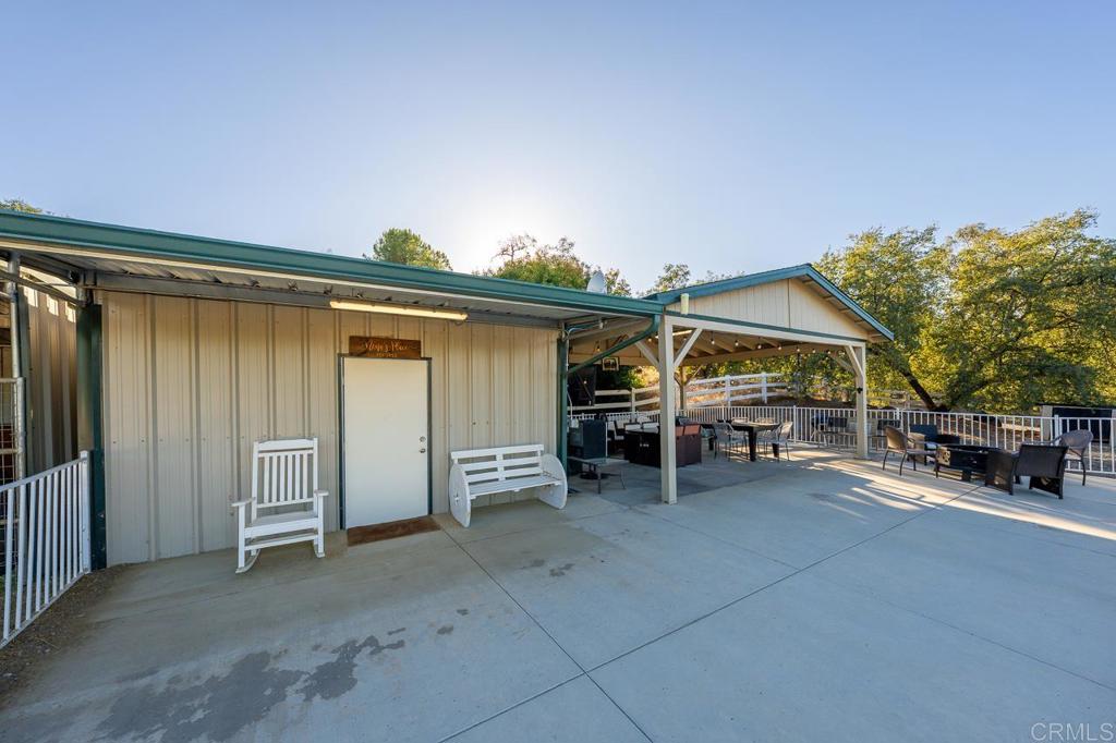 1356 South Grade Road Alpine, CA 91901 - Photo 47 of 68 a view of a patio with table and chairs and a barbeque