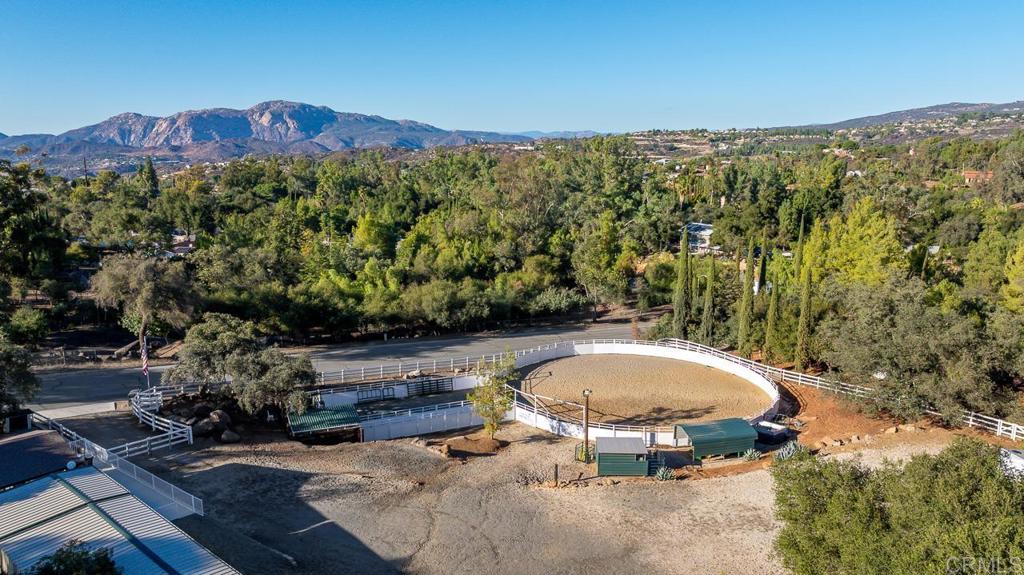 1356 South Grade Road Alpine, CA 91901 - Photo 57 of 68 a view of a swimming pool with a table and a chairs