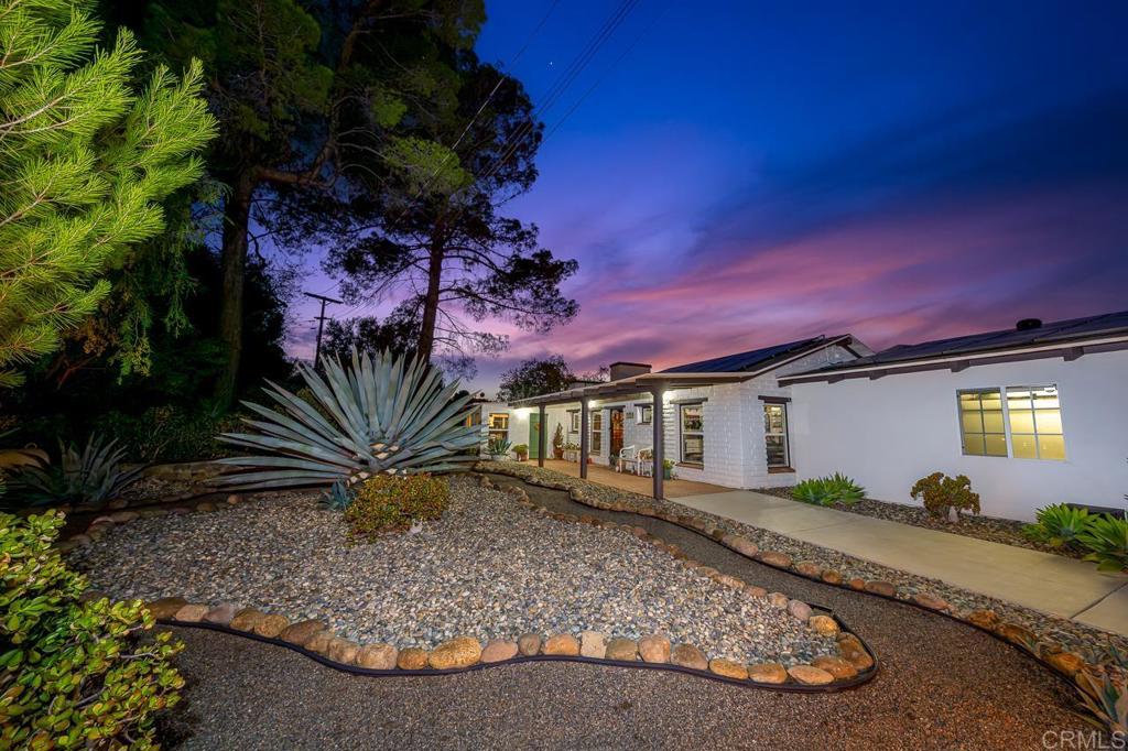1356 South Grade Road Alpine, CA 91901 - Photo 63 of 68 a front view of a house with a yard and potted plants
