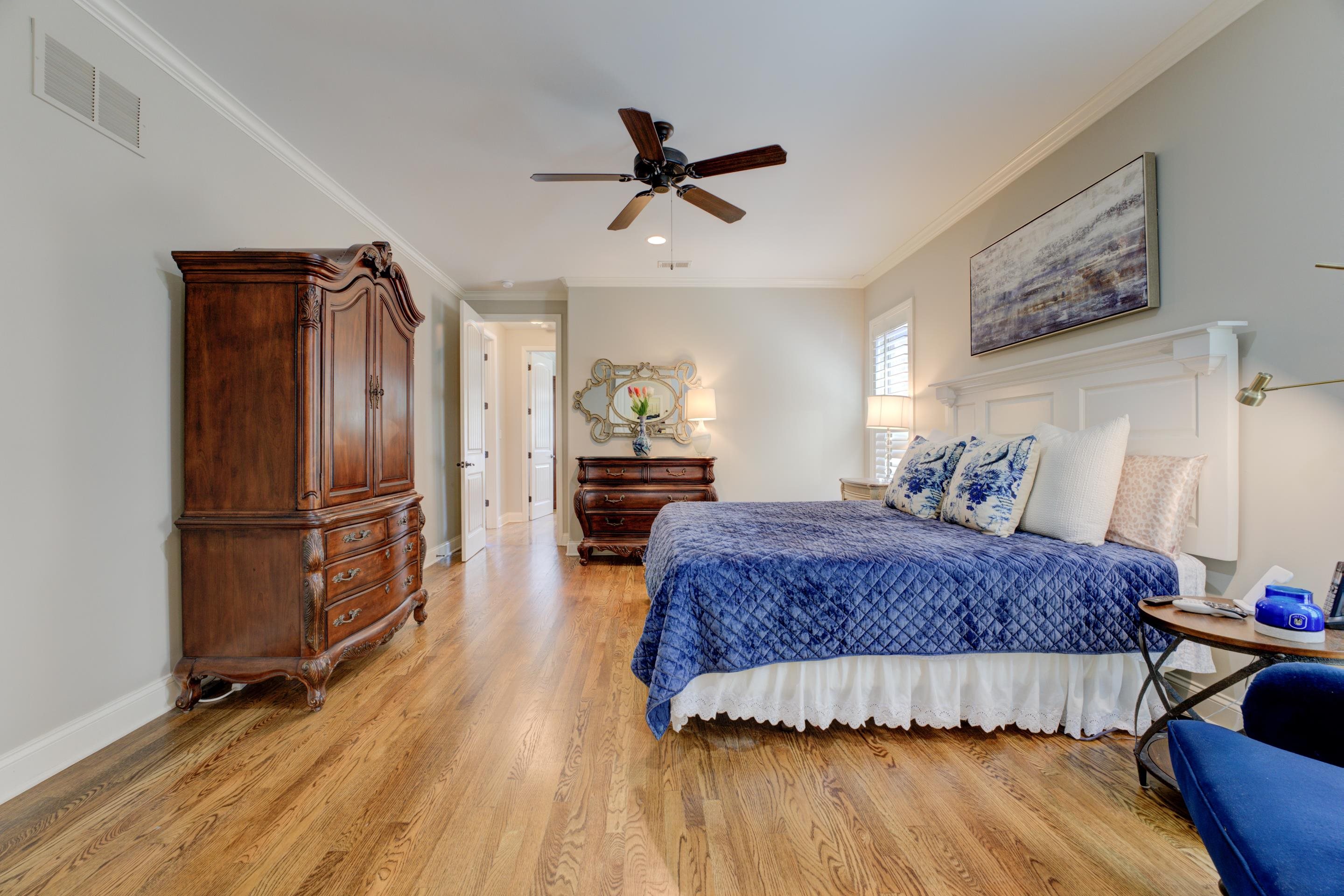 389 West Tarren Mill Circle Collierville, TN 38017 - Photo 7 of 22 a bedroom with a bed and wooden floor