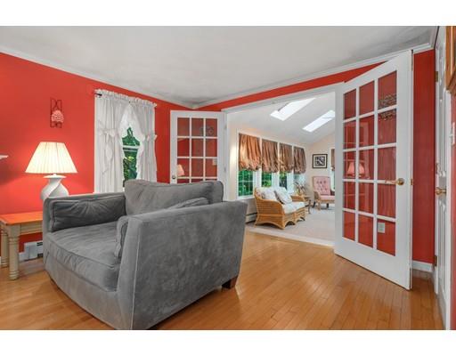 65 Grover Street Beverly, MA 01915 - Photo 16 of 33 a living room with furniture and a large window