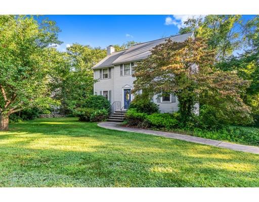 65 Grover Street Beverly, MA 01915 - Photo 2 of 33 a view of a house with a yard