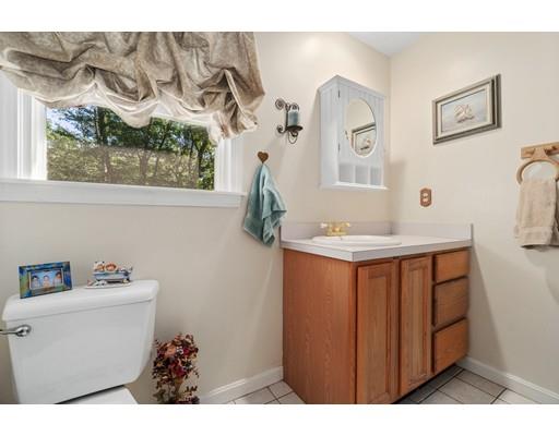 65 Grover Street Beverly, MA 01915 - Photo 22 of 33 a bathroom with a sink and a mirror
