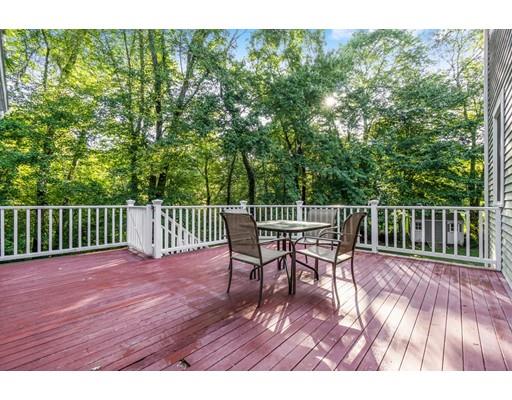 65 Grover Street Beverly, MA 01915 - Photo 29 of 33 a view of a chairs and table on the wooden floor