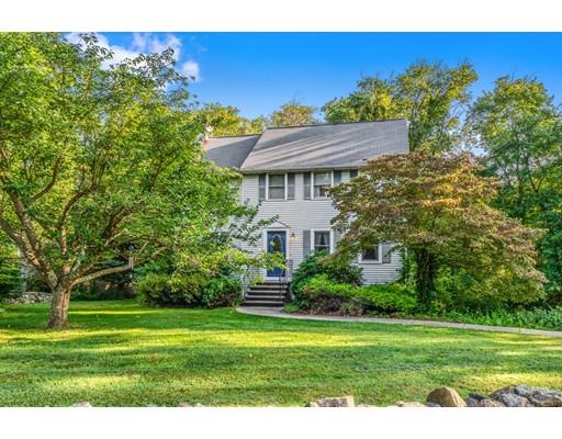 65 Grover Street Beverly, MA 01915 - Photo 3 of 33 a view of a house with a big yard