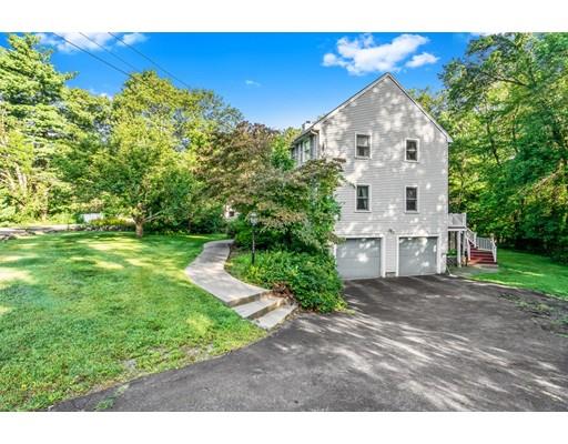 65 Grover Street Beverly, MA 01915 - Photo 33 of 33 a view of a house with a yard