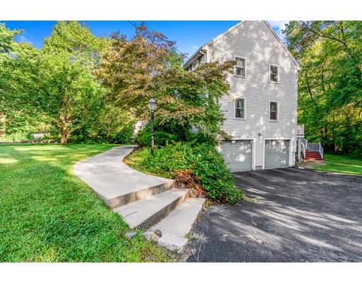 65 Grover Street Beverly, MA 01915 - Photo 4 of 33 a view of a house with a yard