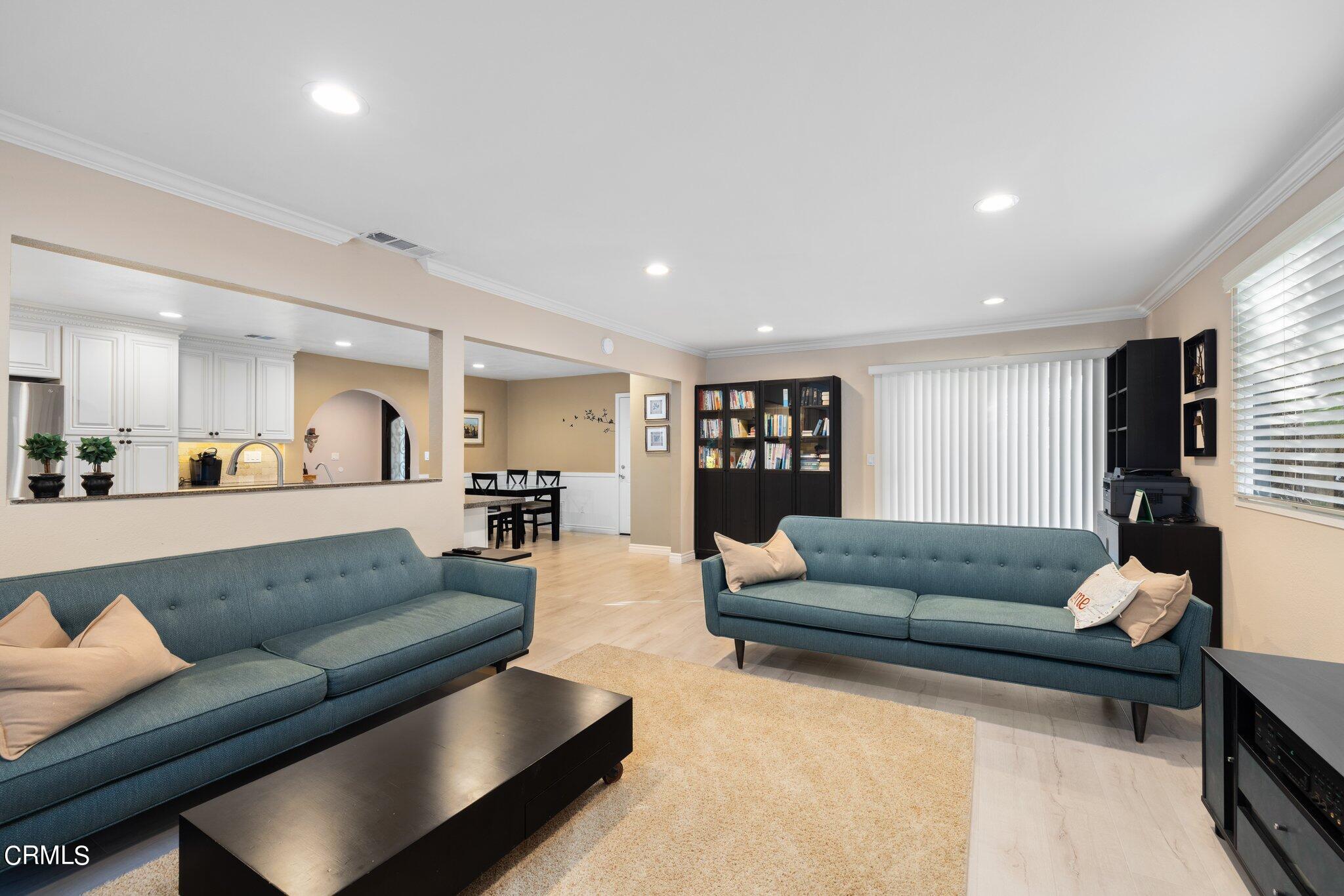 9356 Skyview Terrace Tujunga, CA 91042 - Photo 19 of 39 a living room with furniture and a couch