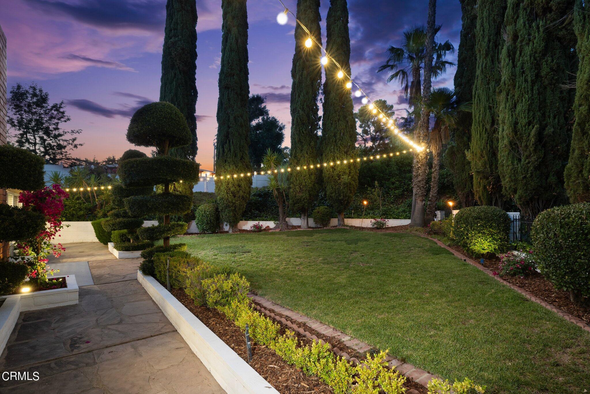 9356 Skyview Terrace Tujunga, CA 91042 - Photo 29 of 39 front view of a house with a yard