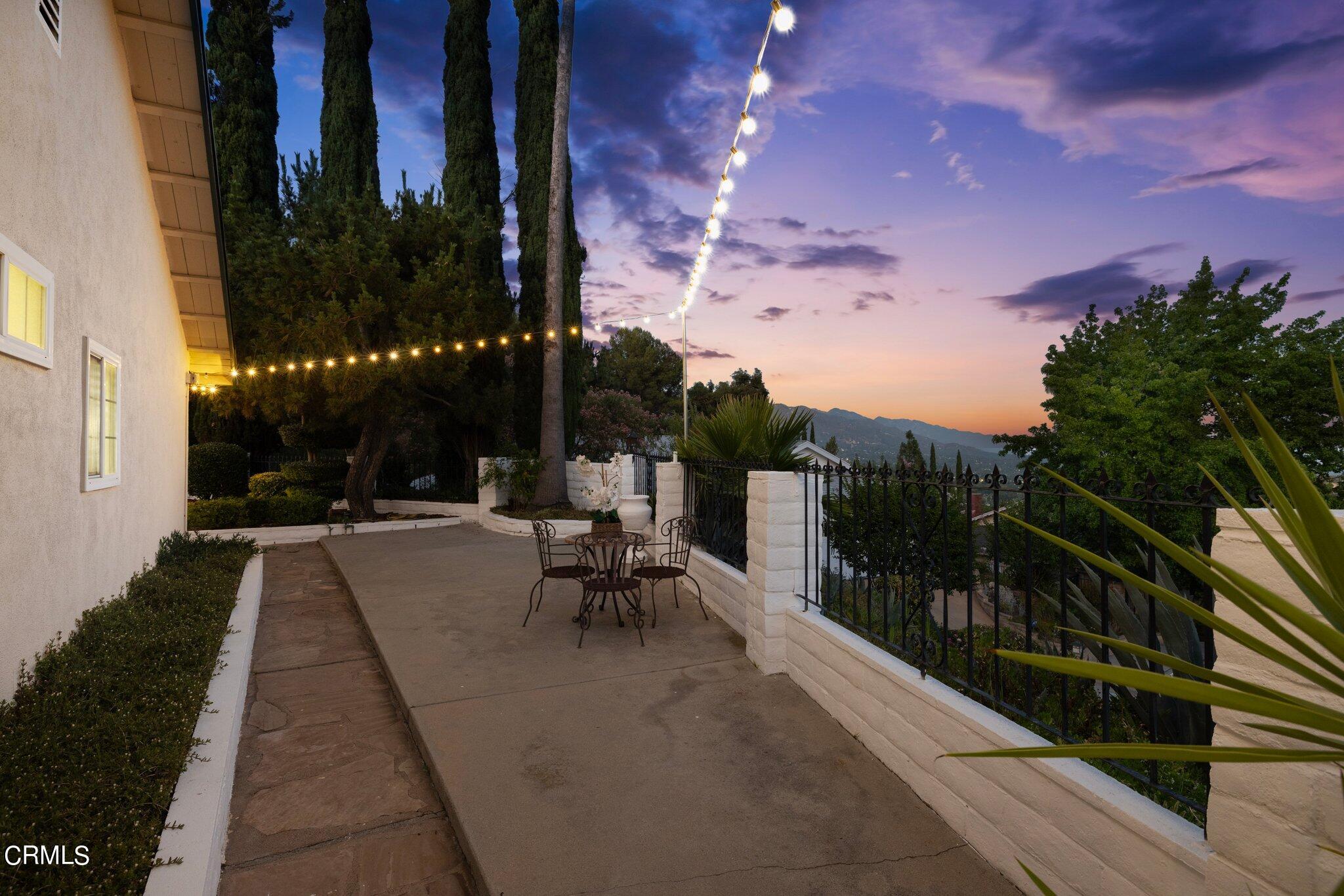 9356 Skyview Terrace Tujunga, CA 91042 - Photo 34 of 39 a view of a patio with a table and chairs