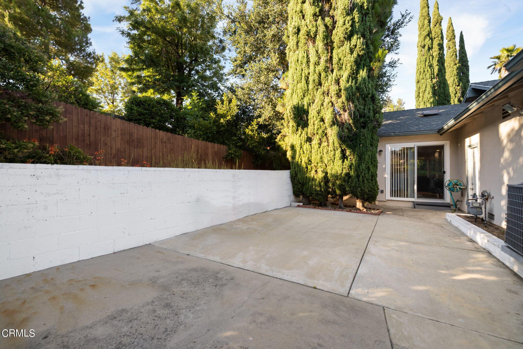 9356 Skyview Terrace Tujunga, CA 91042 - Photo 35 of 39 a backyard of a house with plants and tree