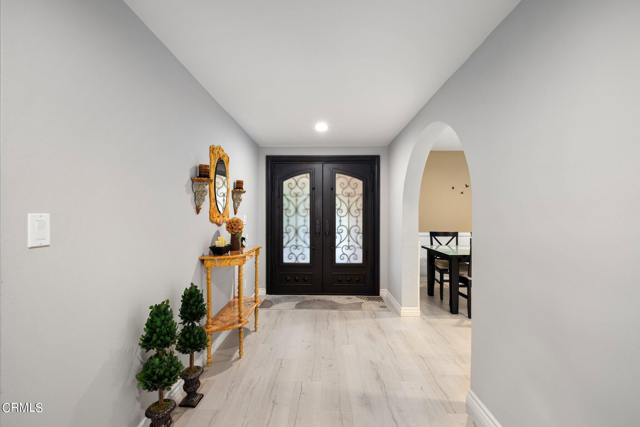 9356 Skyview Terrace Tujunga, CA 91042 - Photo 6 of 39 an entryway with a flower pot and a window