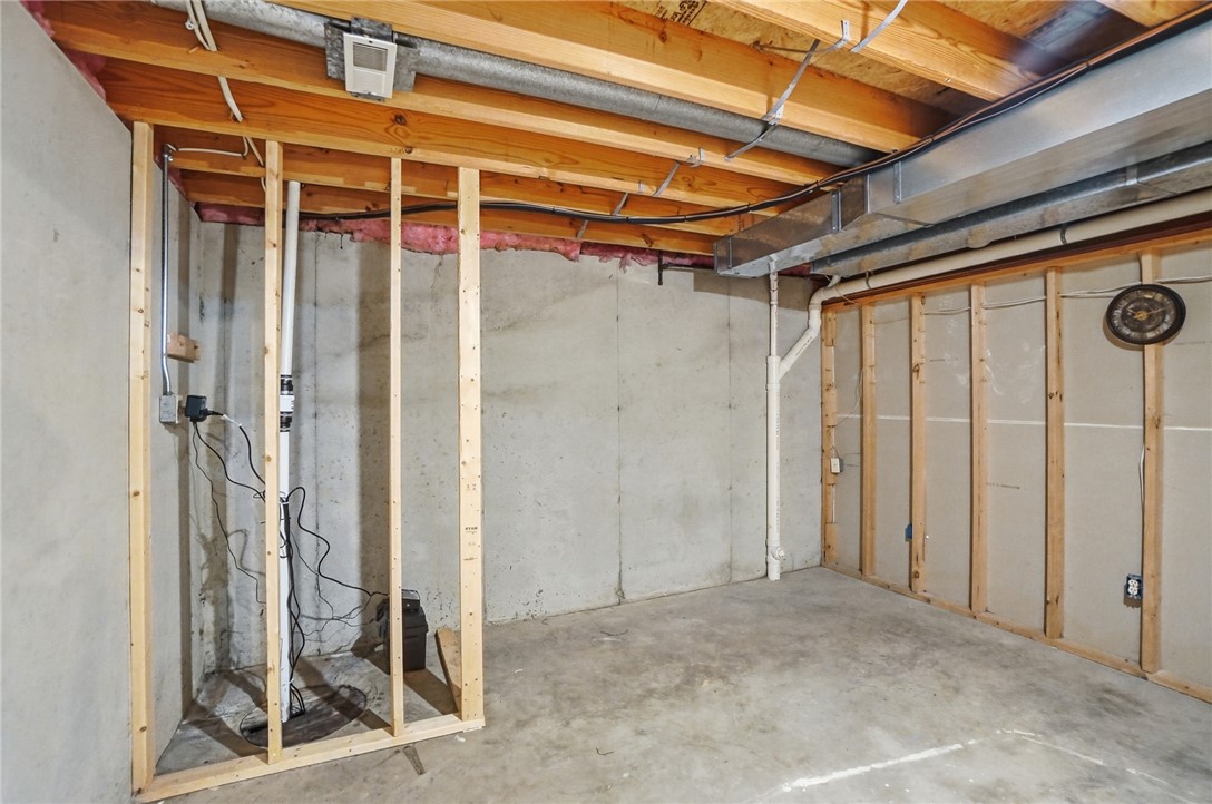 10 Chase Court Springboro, OH 45066 - Photo 62 of 75 This spacious unfinished basement presents a blank canvas for future customization and expansion.