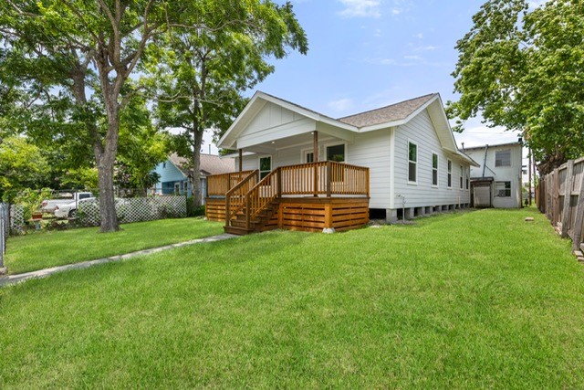 3106 Michigan Street Baytown, TX 77520 - Photo 2 of 14 a front view of house with yard and green space