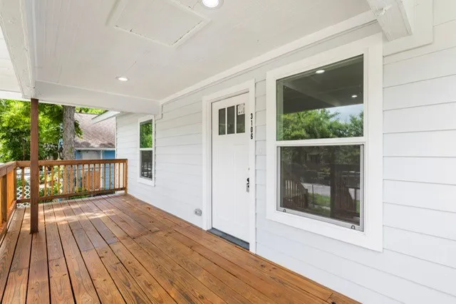 a view of wooden floor from a balcony