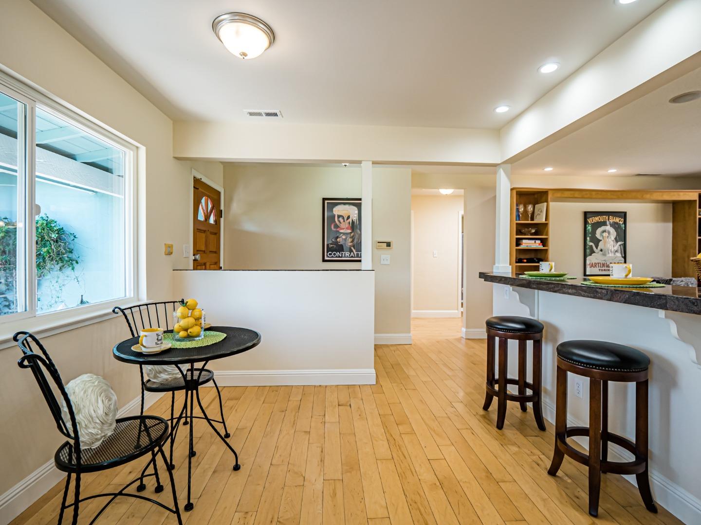 237 Siesta Drive Aptos, CA 95003 - Photo 12 of 43 a living room with furniture and a dining table