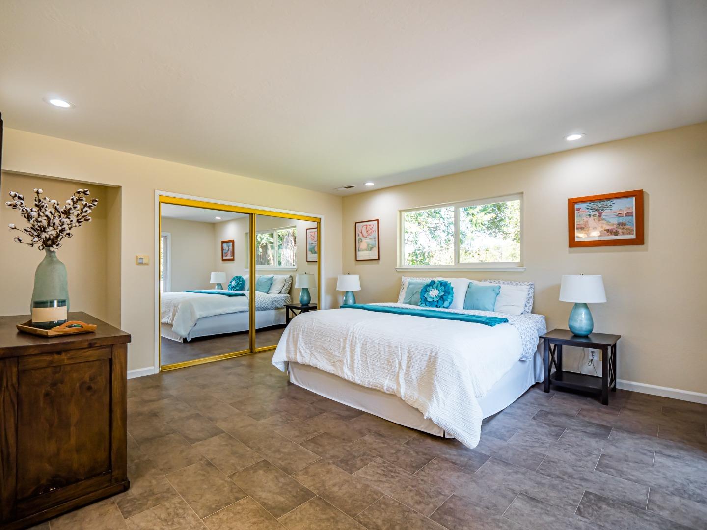 237 Siesta Drive Aptos, CA 95003 - Photo 21 of 43 a bedroom with a bed and a couch