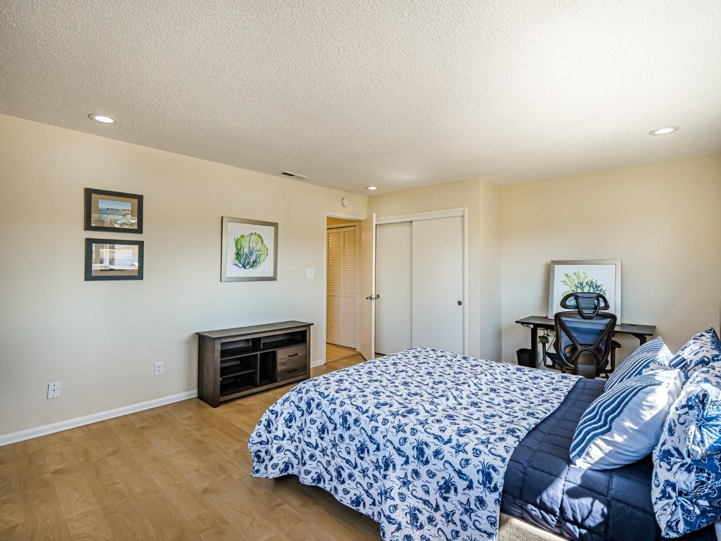 237 Siesta Drive Aptos, CA 95003 - Photo 25 of 43 a bedroom with a bed and a desk