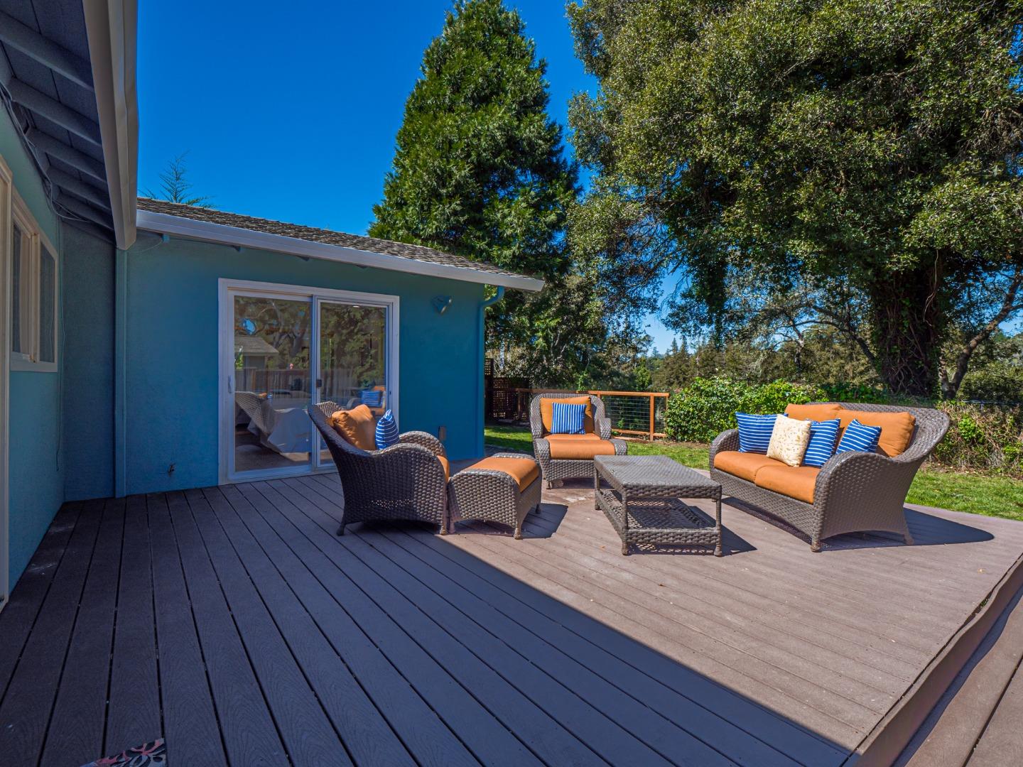237 Siesta Drive Aptos, CA 95003 - Photo 30 of 43 a backyard of a house with wooden floor barbeque oven and outdoor seating