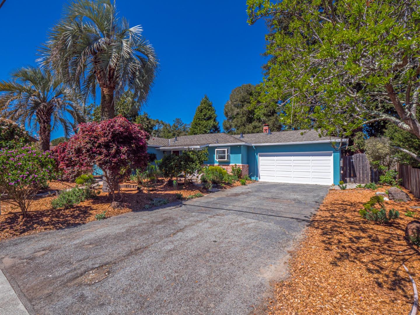 237 Siesta Drive Aptos, CA 95003 - Photo 5 of 43 a view of a house with a yard and garage
