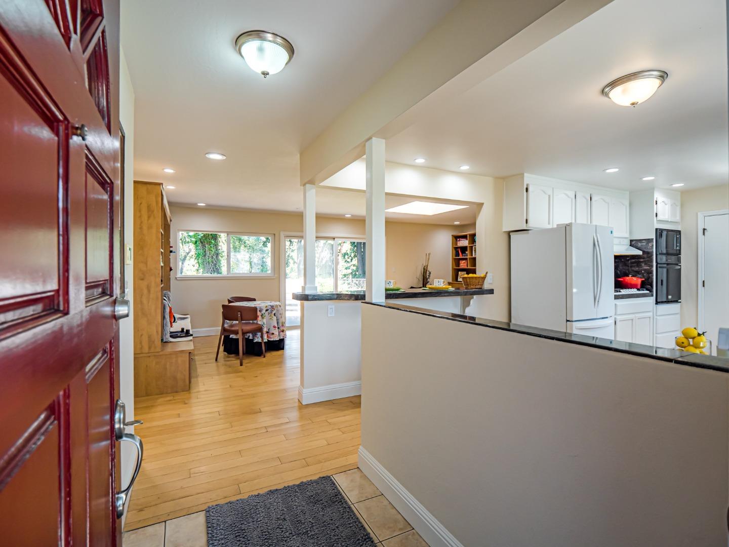 237 Siesta Drive Aptos, CA 95003 - Photo 6 of 43 a view of kitchen with kitchen island and living room