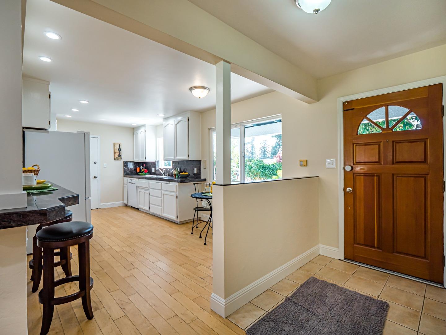 237 Siesta Drive Aptos, CA 95003 - Photo 7 of 43 a view of kitchen with kitchen island dining table and appliances