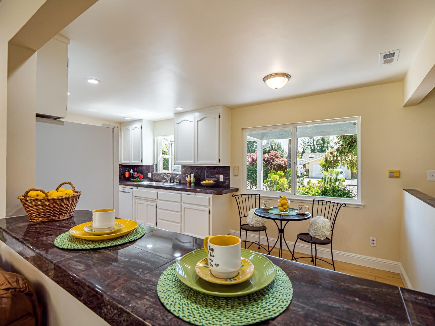 237 Siesta Drive Aptos, CA 95003 - Photo 8 of 43 a living room with furniture and a potted plant
