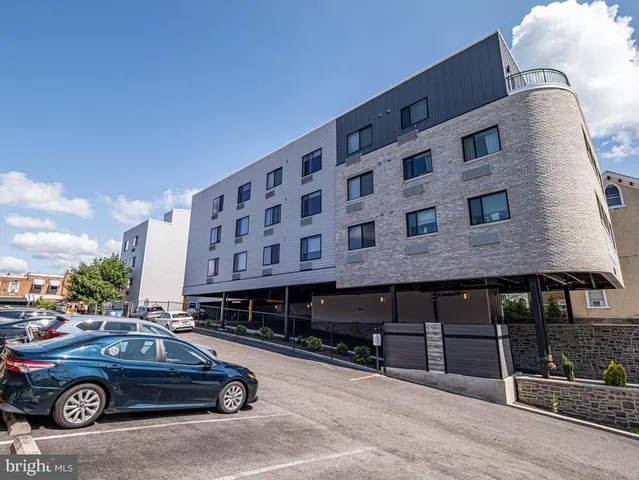 a car parked in front of a building